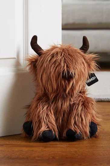 Le butoir de porte pour vache des Highlands Hamish coûte 22 £ chez Next